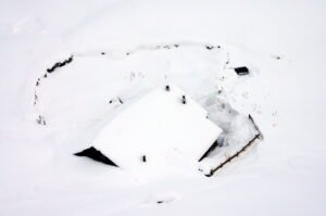 house part buried in the snow